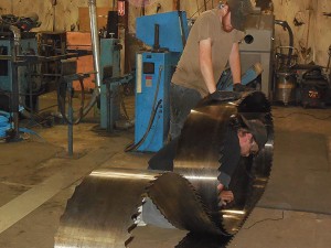 Corey and Tyler packaging up a bandsaw